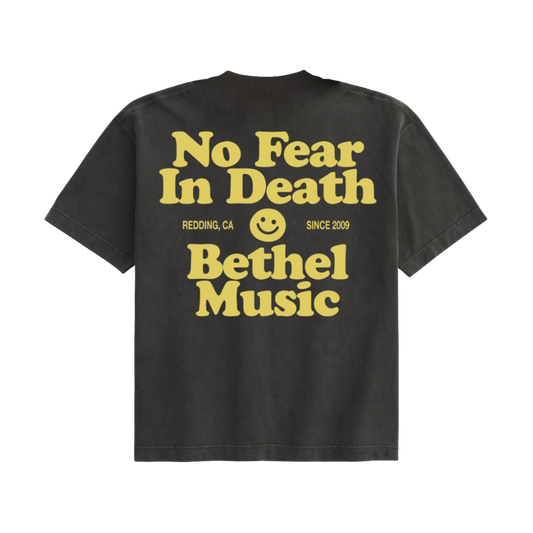 Black t-shirt with yellow text 'No Fear In Death Bethel Music' on a white background